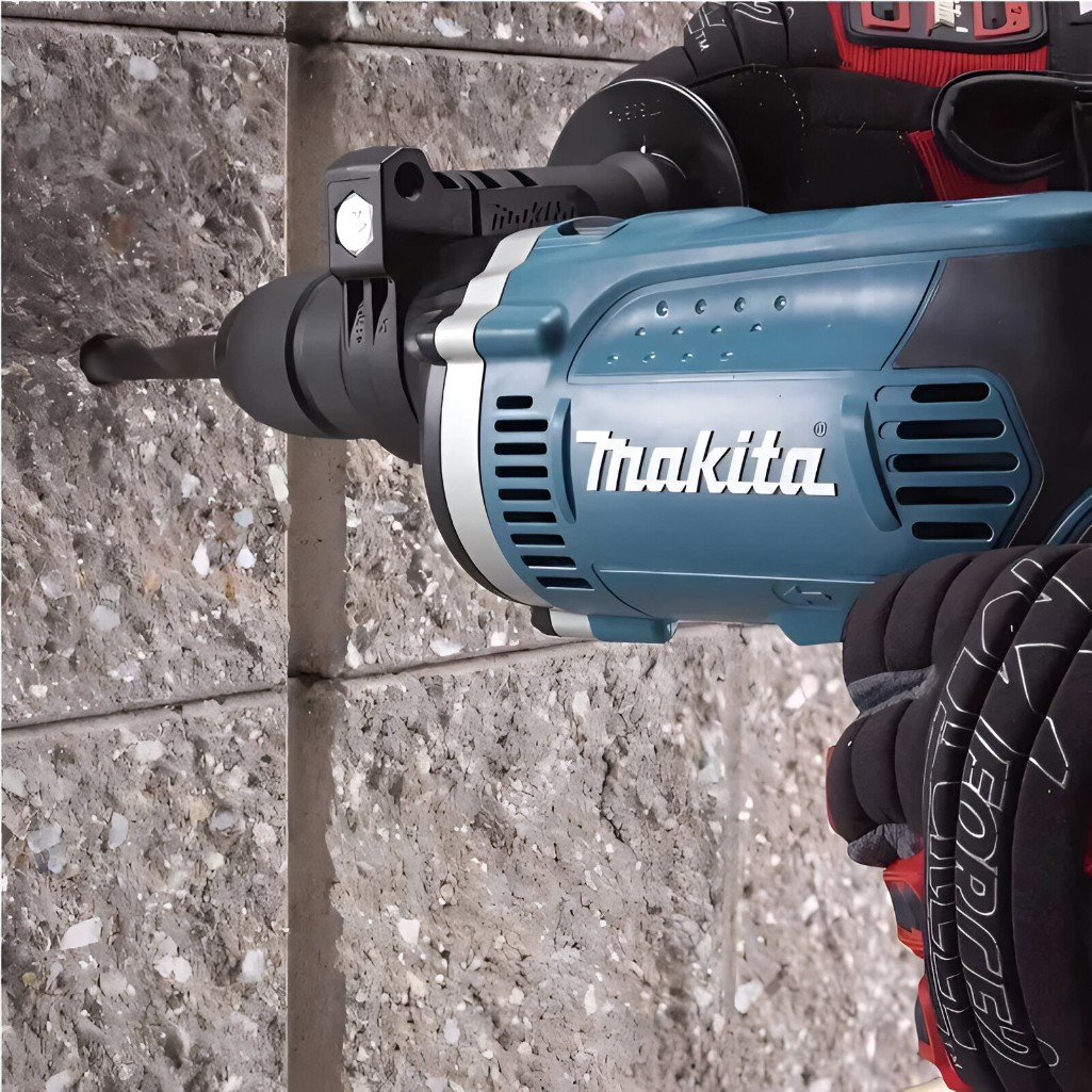 Дрель ударная Makita HP1631K, реверс, 710 Вт, 44800 уд/мин, 3200 об/мин, регулировка оборотов и частоты ударов